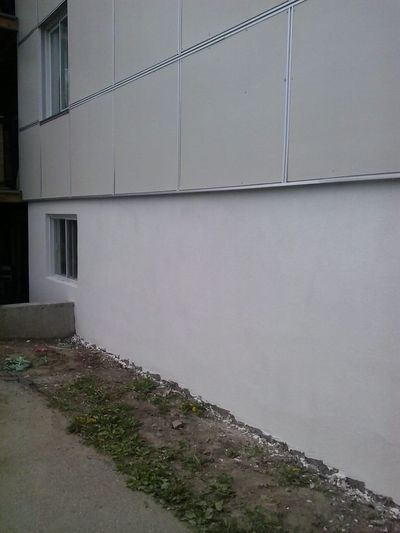 Close-up of the white acrylic finish on a newly coated foundation.